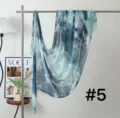 Detailed view of the blue tie-dye modal long scarf, showing soft fabric texture and gradient. - Geometric #5