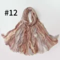 Close up view of the gradient crinkle scarf detail, showing soft texture and vintage striped pattern. - Style 12