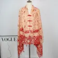 Chinese style vintage ethnic print women shawl with red frog buttons and soft cape design. - Color 1