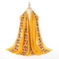Close-up of yellow cotton linen shawl with exquisite ethnic floral embroidery details. - Two-Row Embroidery Ginger Yellow