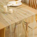 Sheer mesh table runner with delicate embroidered floral and butterfly designs for home decor. - Floral A Light Green