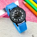 Reloj de cuarzo para niños con correa de lona de nailon azul y esfera negra clara. - Azul Claro y Negro