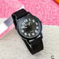 Reloj de cuarzo de lona para niños con esfera negra y números claros, estilo casual. - Todo Negro