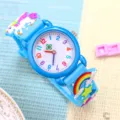 Kinder Cartoon Einhorn Quarzuhr, süßes blaues Regenbogen Silikonarmband mit bunten Zahlen. - Schmetterlingsarmband - Ganzblau