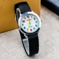 Kids quartz watch with black nylon strap and colorful digital white dial casual daily use. - Black