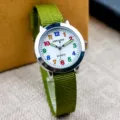 Children's green nylon strap quartz watch with colorful numbers and luminous hands for kids - Luminous Hands, Green