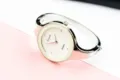 Elegant women quartz watch with stylish bangle strap and sparkling diamond hour markers. - Silver White
