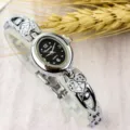 Women vintage minimalist bracelet quartz watch with oval small dial and lovely heart strap. - Fashion / Silver Black