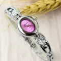 Women vintage minimalist quartz watch, small oval pink dial, cute heart silver bracelet. - Fashion / Silver and Rose Red