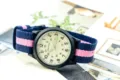 Montre nylon enfant aiguilles lumineuses cadran 24 heures bracelet rayé bleu et rose - Bleu, rose et bleu