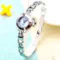 Montre quartz femme cœur creux élégante petite montre bracelet argentée principale - Style ajouré - Bleu clair argenté