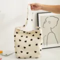 Canvas tote bag with black heart print, casual shoulder bag and large capacity handbag. - Small Crossbody Bag