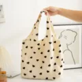 Beige canvas tote bag with black heart print, casual shoulder shopping bag for women daily use. - Vest Bag