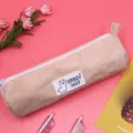 Korean style corduroy cylindrical pencil case in beige with zipper, cute stationery storage bag. - Creamy Yellow