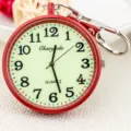 Red quartz pocket watch with luminous dial, convenient keychain fob design for students. - Red
