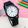 Kinder quartz horloge met zwarte siliconen band, witte wijzerplaat en datumweergave. - Zwart Wit