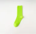 Neon green ribbed mid-tube cotton socks for women, stylish and vibrant daily casual wear item. - One Size / Fluorescent Green