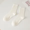 Simple white ribbed mid-calf socks for women, comfortable daily casual cotton college style. - One Size / Cream