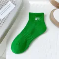 Green cotton short socks for women, trendy ankle socks with NA embroidery, daily casual wear. - One Size / Light Green