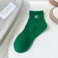 Green cotton women short socks with NA embroidery, stylish summer casual footwear for daily wear. - One Size / Dark Green