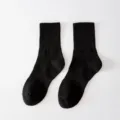 Men's solid black mid-tube cotton socks, breathable and comfortable for daily wear. - One Size / Black