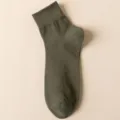 Men solid green cotton mid-calf casual socks, comfortable breathable daily wear variant. - Dark Green