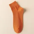 Men's cotton mid-calf casual socks in vibrant orange color, breathable and comfortable. - Orange