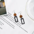 Close-up of geometric wooden earrings with black hollow frames on a white background. - Brown Circle & Black Rectangle Frame Style (11)