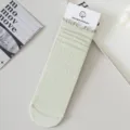 Light green cooling mid-tube socks with ruffled edge and ribbed knit design for summer. - Pale Green
