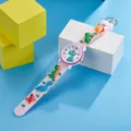 Kids 3D cartoon dinosaur pink quartz watch detail view showing cute animal strap and clear dial. - Pink