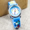 Orologio per bambini blu con auto e numeri colorati, cinturino in morbido silicone. - Azzurro