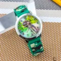 Orologio al quarzo per bambini con quadrante dinosauro cinturino mimetico verde - Drago dal viso colorato