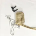 Handmade gold woven mini earphone bag with silver chain heart pendant and stylish tassel detail - Gold