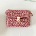 Detail view of pink handmade crochet crossbody bag, soft fabric yarn surface and metallic clasp. - 24*17*5cm / Dusty Pink