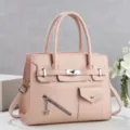 Sac à main pour femme en cuir rose avec anses et poches avant élégantes pour tous. - Rose