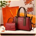Details of luxury women handbag set with structured burgundy tote and matching crossbody bag. - Gift Box Packing / Red