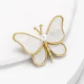 Elegant gold-tone butterfly brooch with mother of pearl and pearl detail for women suits. - Style 2 / Gold