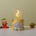 Cute cat night light with bulb design, warm glowing LED ambiance desk lamp for bedroom gift. - Cute Cat - Pulsating Light Wick