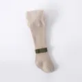 Baby ribbed cotton tights in beige with a cute green velvet bow, cozy autumn wear variant. - Size 21/23 (1-2 Years) / Khaki