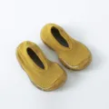 Senfgelbe Babysocken mit Sohle, rutschfeste Kleinkind Lauflernschuhe aus Baumwolle. - 20-21 / Gelb
