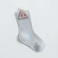 Cute newborn baby socks in light blue solid ribbed knit with sweet plush triangle decor. - Gray