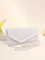 Pochette de soirée pailletée argentée avec chaîne métallique, vue détaillée de la texture. - Argent