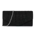 Black glitter evening clutch bag detail showing pleated texture and silver chain strap. - Black