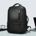 Zaino per laptop casual da uomo in pelle PU con porta USB per viaggio e lavoro. - Nero