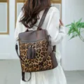 Retro Damen Rucksack mit Leopardenmuster Quaste modische multifunktionale Studententasche - Kaffeebraun