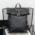 Black PU leather roll top backpack for men, large capacity casual travel school bag with buckle. - Black