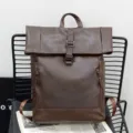 Stylish brown PU leather backpack for men, large capacity casual travel and laptop daypack. - Dark Brown