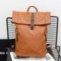 Brown PU leather roll-top backpack for men, large capacity casual travel school bag. - Tan