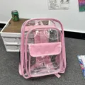 Transparenter pinker PVC Rucksack für Schule und Reisen, mit robusten Gurten und Vordertasche. - Rosa