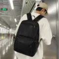 Wasserdichter schwarzer PU Leder Rucksack für Damen und Herren, modische große Reisetasche. - Schwarz
